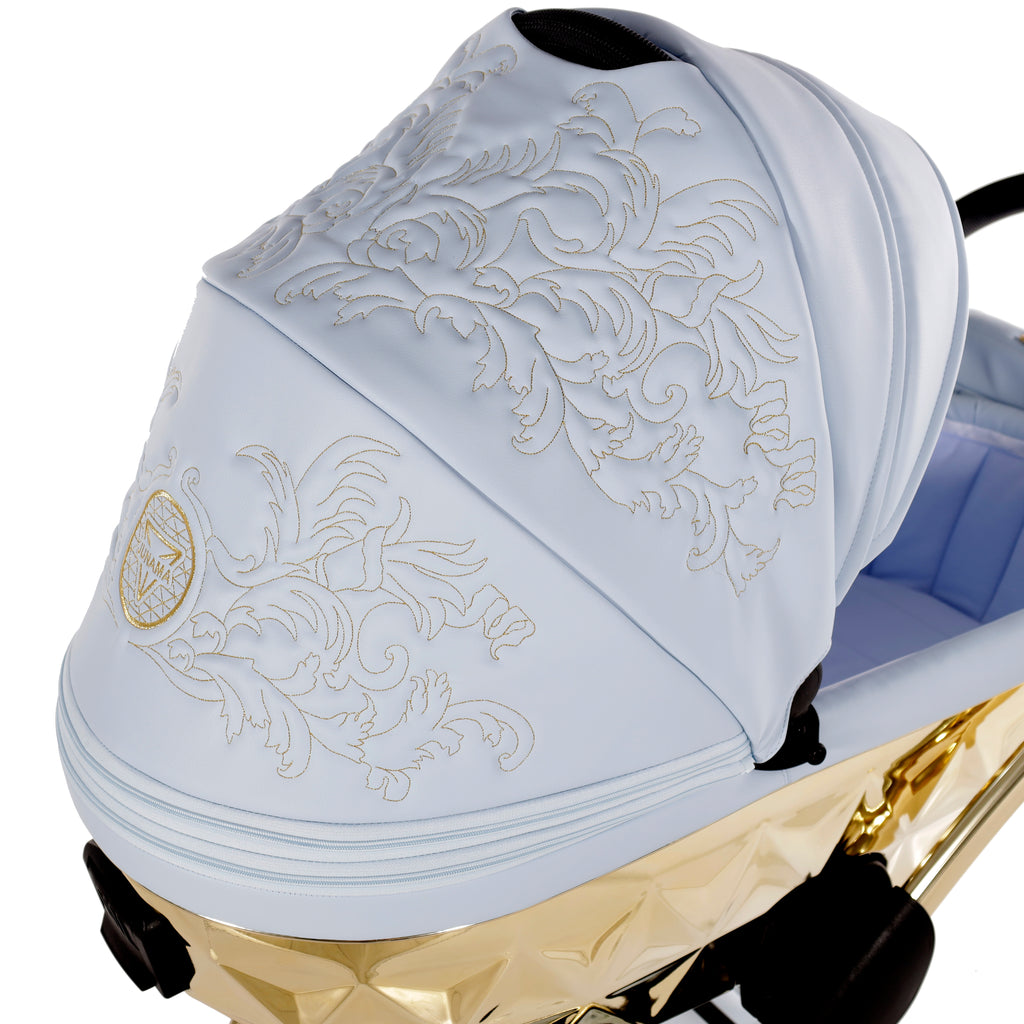 Carro de bebé Junama Enzo Azul y Dorado